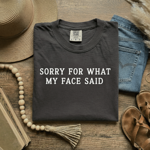 T-shirt with "sorry for what my face said"